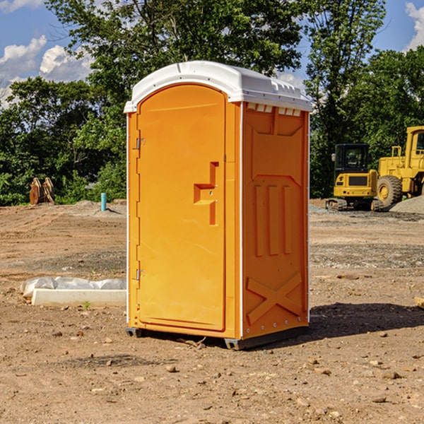 what is the cost difference between standard and deluxe portable toilet rentals in South Russell